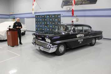 Windsor Police Chief Al Frederick shows off a 1958 Windsor police cruiser at the unveiling of its 150th anniversary car, April 18, 2017. (Photo by Mike Vlasveld) 