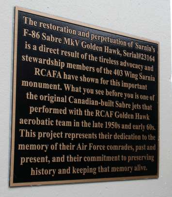 Plaque unveiled at the refurbished Golden Hawk monument at Germain Park May 31, 2015 (BlackburnNews.com photo by Dave Dentinger)