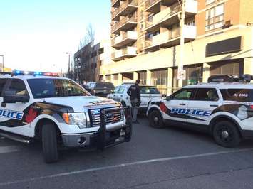 Police conduct an investigation at the scene of a stabbing in the 800-block of Ouellette Ave. in Windsor, April 24, 2015. (Photo by Jason Viau)