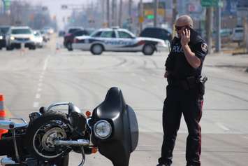 One person has been sent to hospital following a crash at the intersection of Lauzon Rd. and McHugh St., April 1, 2015. (Photo by Jason Viau)