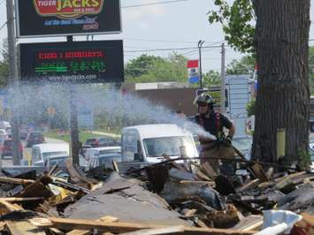 London firefighters continue to douse hotspots after a fire reduced the former Hook's Restaurant at Wharncliffe and Southdale to rubble, May 30, 2018. (Photo by Miranda Chant, Blackburn News) 