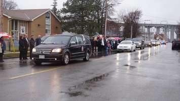 Crowds lined Michigan Ave. Monday to remember former Pt. Edward Mayor Dick Kirkland. December 21, 2015 (BlackburnNews.com Photo by Briana Carnegie)