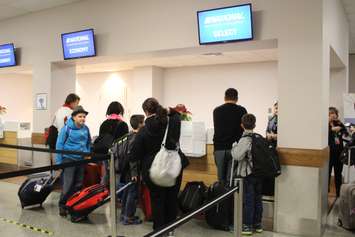 National Airlines ticket window in the YQG airport, December 17, 2015. (Photo by Maureen Revait) 