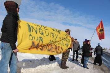 Walpole Island residents join the nationwide #ShutDownCanada movement at the intersection of Hwy. 40 and Dufferin Ave. on February 13, 2015. (Photo by Jason Viau)