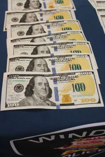 File photo of counterfeit US currency. (Photo by Maureen Revait) 