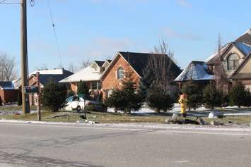 A single-vehicle crash closes a stretch of County Rd. 20 in Amherstburg, January 18, 2016. (Photo by Mike Vlasveld)