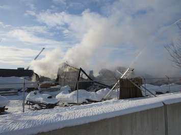 A rear storage warehouse at Hully Gully on Wharncliffe Rd. destroyed by fire, December 28, 2017. (Photo by Miranda Chant, Blackburn News)