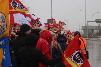 Members of the Customs and Immigration Union (CIU) rally along Huron Church Rd in Windsor on January 12, 2018. Photo by Mark Brown/Blackburn News