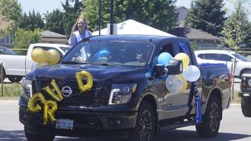 Lambton College 2021 graduates take part in a drive-by parade at the Sarnia school.  16 June 2021.  (BlackburnNews.com file photo)