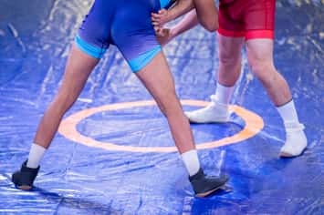 Wrestling. Photo by Augustas Cetkauskas, iStock / Getty Images Plus