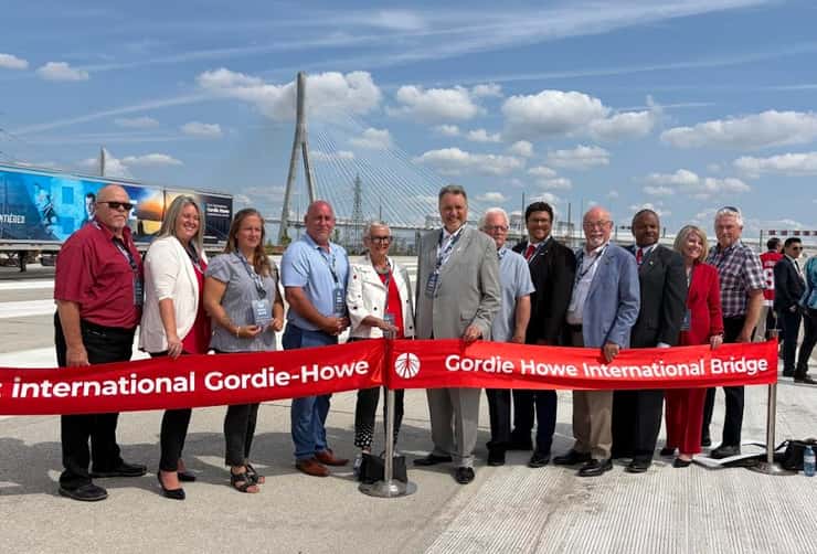(Photo of dignitaries at the Gordie Howe International Bridge ribbon-cutting ceremony by Maureen Revait)