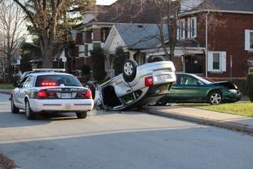 Windsor police respond to a rollover accident at the intersection of Pierre Ave. and Ellis St. E on December 1, 2014. (Photo by Jason Viau)