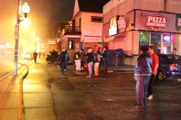 Firefighters respond to a fire at 1122 Wyandotte St. E in Windsor on December 16, 2014. (Photo by Ricardo Veneza)