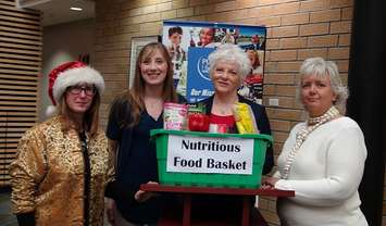 Officials announce the cost of a Nutritious Food Basket:
From left:  Jill Umbach, Bruce Grey Poverty Task Force;  Laura Needham, Grey Bruce Health Unit; Medical Officer of Health Dr. Hazel Lynn;  Francesca Dobbyn, Bruce Grey United Way. 
Photo by Kirk Scott