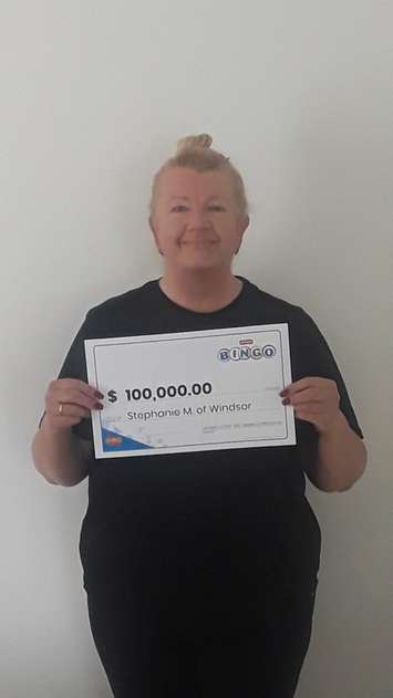 Stephanie Mason-Rogers of Windsor won a $100,000 prize with Instant Bingo Doubler. (Photo provided by OLG).