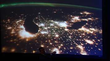 Photo of Great Lakes as seen from space. Photo shared during Chris Hadfield's keynote address in Sarnia.  May 25, 2016 (BlackburnNews.com Photo by Briana Carnegie)