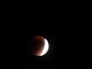 A super blood moon occurred on September 27, 2015.  (Photo by Simon Crouch)