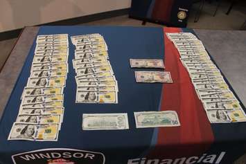 Counterfeit money found by the Windsor Police Service on display at media conference, December 1, 2015 (Photo by Maureen Revait) 