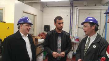 Green Party leader Mike Schreiner (left) speaks with process engineer at Origin Materials Aashav Patel (middle) and Green Party Sarnia-Lambton candidate Kevin Shaw (right). March 21, 2018. (Photo by Colin Gowdy, Blackburn News)
