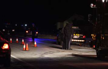 OPP officers investigate a fatal incident on Walker Rd. in Oldcastle, February 9, 2015. (Photo by Mike Vlasveld)