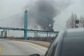 Traffic is backed up on the Ambassador Bridge during a fire, April 14, 2015. (Photo by Mike Vlasveld)