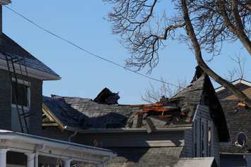 Firefighters at the scene of two house fires in the 800-block of Assumption St. in Windsor March 2, 2015. (Photo by Adelle Loiselle.)