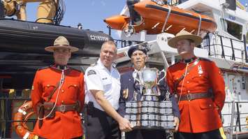 The Memorial Cup is loaded on the Canadian Coast Guard Ship Constable Carriere to travel to the Memorial Cup host city of Windsor.  May 18, 2017 (Photo by Melanie Irwin)