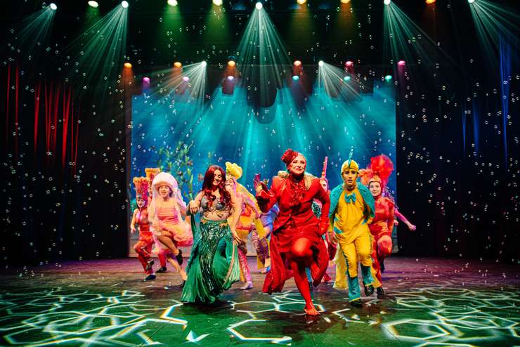 Kalie Woodcock as Ariel, Tayler Hartwick as Sebastian, Christian O’Malley as Flounder, and Ensemble. Photo submitted by the Imperial Theatre