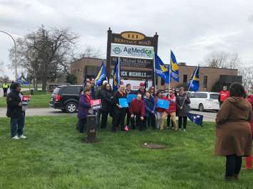 Dozens gather in Chatham on Tuesday, April 30, 2019 to rally against provincial funding cuts to education. (Photo by Allanah Wills) 