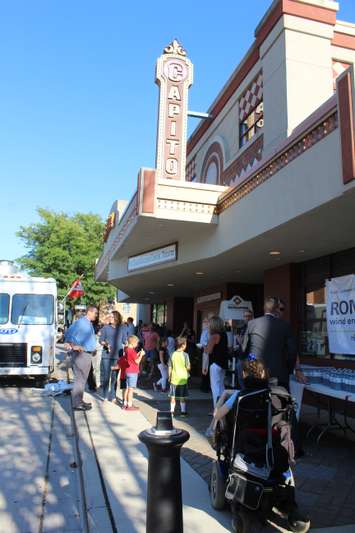 Gathering at the Capitol Theatre for the free presentation on the benefits to thinking positive. September 13, 2016. (Photo by Natalia Vega)