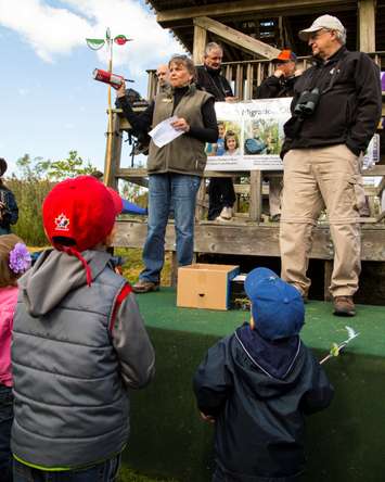 HBMO banding experts show off their catch to a crowd at the 2015 edition of the Festival of Hawks. (Photo courtesy ERCA)