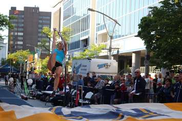 Athletes compete in a pole vaulting competition on Ouellette Ave., May 22, 2015. (Photo by Jason Viau)