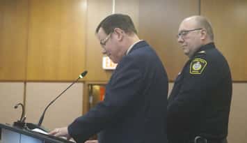 Sarnia Police Service Board Chair Paul Wiersma and Chief Derek Davis in council chambers. November 17, 2025. (Photo by Natalia Vega)