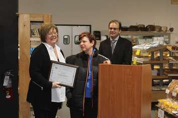 Sara Ebare accepting an award on behalf of her late husband Sid. February 21, 2017. (Photo by Natalia Vega)