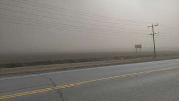 Soil blows across the road in Chatham-Kent, causing visibility issues for drivers. March 8, 2017. (Submitted photo)