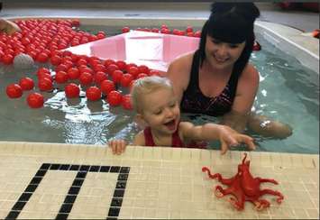 2 year old Amelia Schalk-Molson works with her physiotherapist Caitlin Wright in the pool at Pathways Health Centre for Children in Sarnia. November 27, 2018 Photo by Melanie Irwin 