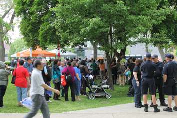 A crowd enjoys festivities in the park near the new Windsor City Hall on May 26, 2018. Photo by Mark Brown/Blackburn News.