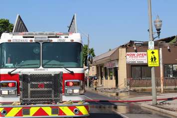 The investigation into Monday's fire on Wyandotte St. E between Parent Ave. and Marentette St. in Windsor continues.  (Photo by Adelle Loiselle)