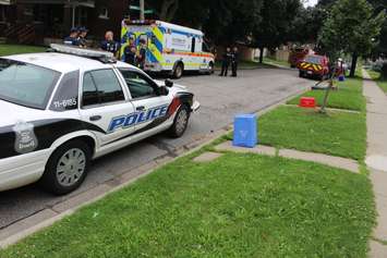 Windsor police deal with a standoff situation in the 1400-block of Windermere Rd., July 9, 2015. (Photo by Jason Viau)