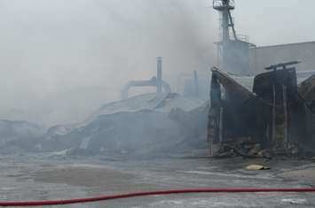 Smoke lingers in ruins of front of building (blackburnnews.com photo)
