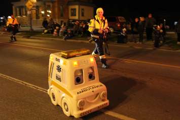 Local residents line the streets of Downtown Chatham during the Santa Clause Parade, November 20, 2015. (Photo by Ricardo Veneza)
