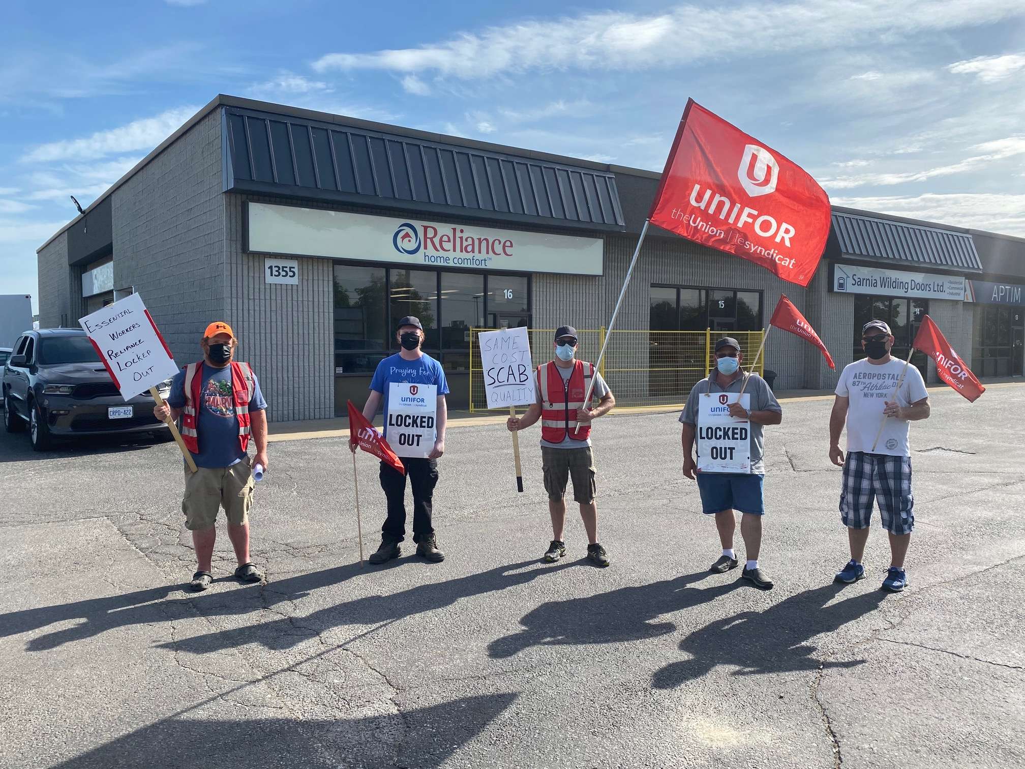 Reliance workers rally at headquarters as lockout continues
