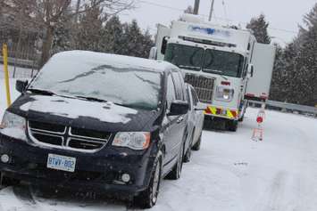Windsor police detectives were back canvassing neighbours on January 21, 2015 about a murder on Benjamin Ave. that happened on December 11, 2014. (Photo by Jason Viau)