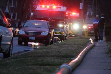 Windsor fire crews battle a blaze at 1574 Gladestone Ave., April 7, 2015. (Photo by Jason Viau)