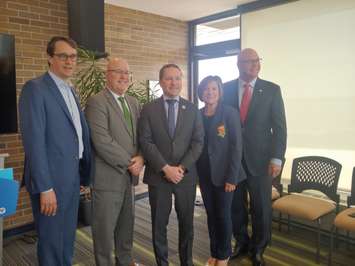 Lambton-Kent-Middlesex MPP Monte McNaughton, Minister of Municipal Affairs and Housing Steve Clark, London Mayor Josh Morgan, Middlesex County Warden Cathy Burdghardt-Jesson and Elgin-Middlesex-London MPP Rob Flack at an announcement at London City Hall on April 25th, 2023. (Craig Needles, Blackburn Media)