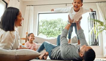 Family playing together (Image courtesy of PeopleImages / iStock / Getty Images Plus via Getty Images)