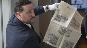Sarnia Historical Society President Ron RealeSmith opens a Sarnia General Hospital time capsule from 1895. September 27, 2019 Photo by Melanie Irwin