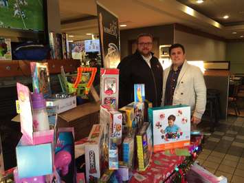 Salvation Army Captain Mark Braye and CHOK's AJ Reynolds at 47th Gift of Christmas Launch. 