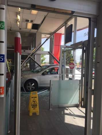 A car crashed through the front entrance of the Shoppers Drug Mart at 645 Commissioners Rd. E, June 12, 2018. Photo submitted by Alexandria Brewer.