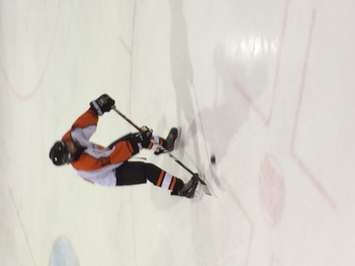 A Drayton player makes a pass in his end. (Photo by Marty Thompson)